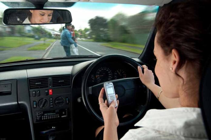 mobile phone while driving causes accidents.