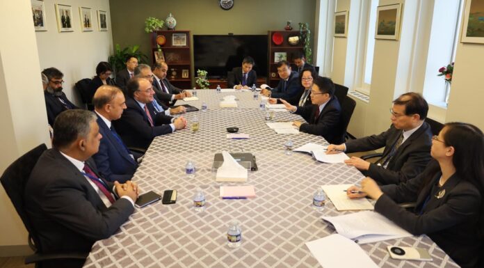 Meeting with Liao Min