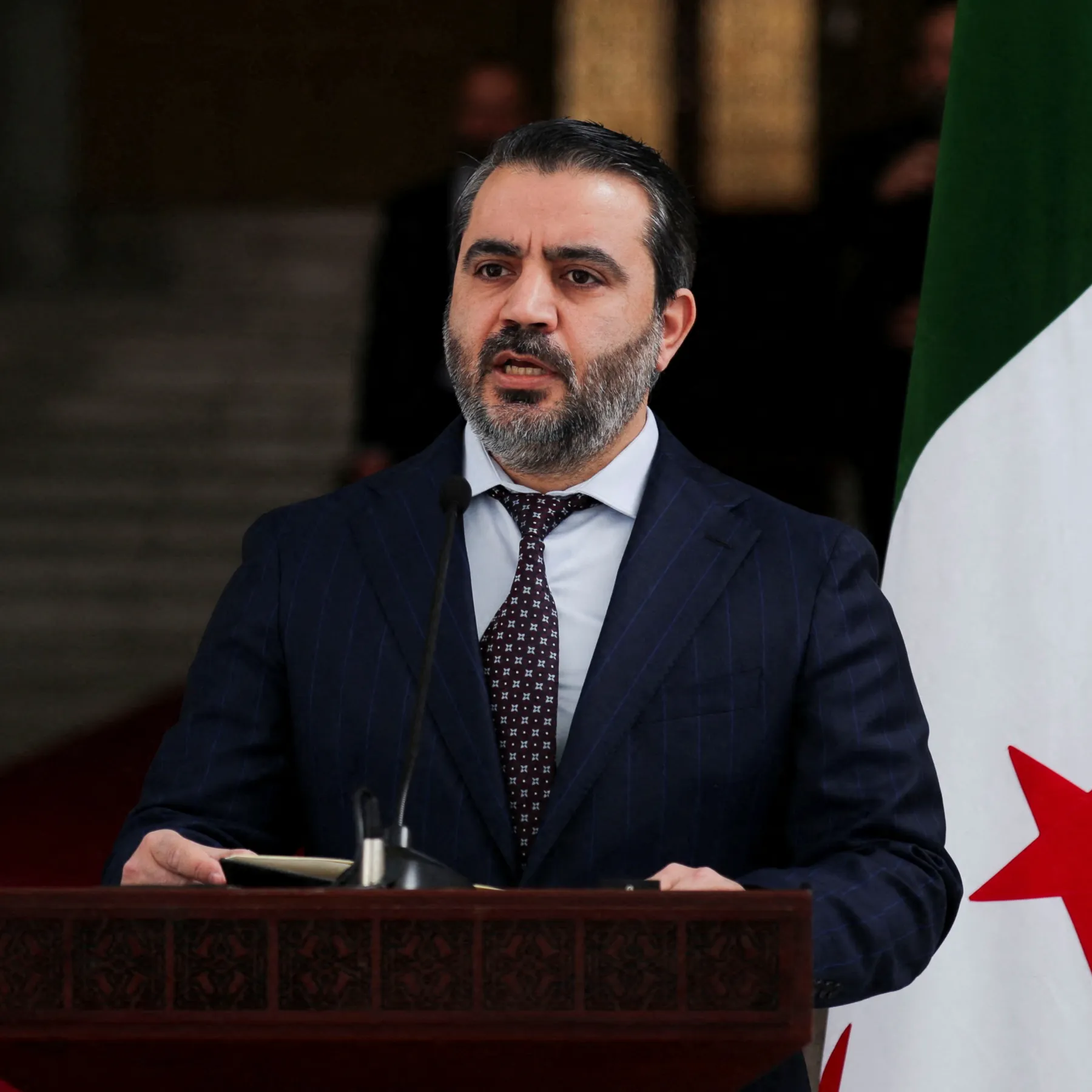 Foreign Minister Asad Al-Shaibani