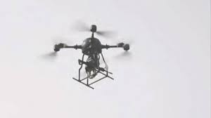 rifle-carrying drone