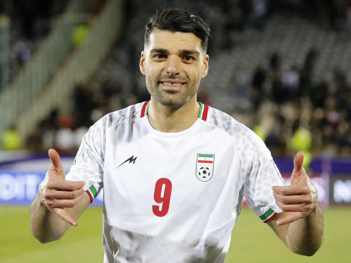 Iranian football team captain Mehdi Tarimi