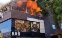 fire at liquor shop in India