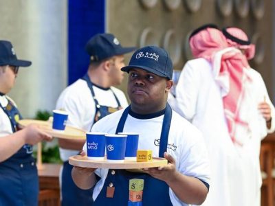Staff members prepare orders at Ratio cafe's Alkhobar branch.