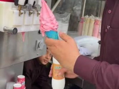 Ice cream uncles serve children during rising temperatures in Peshawar